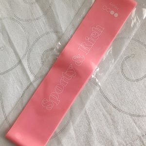 Sporty and Rich pink resistance band